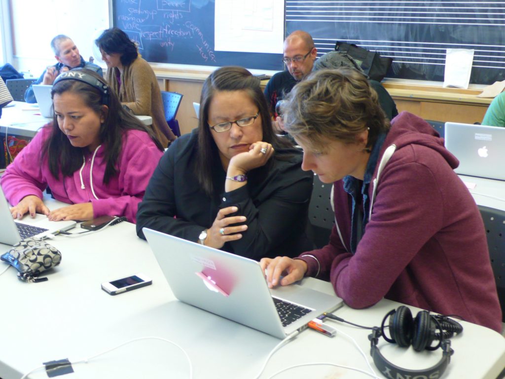 A photo showing participants in a Re•Vision digital storytelling workshop